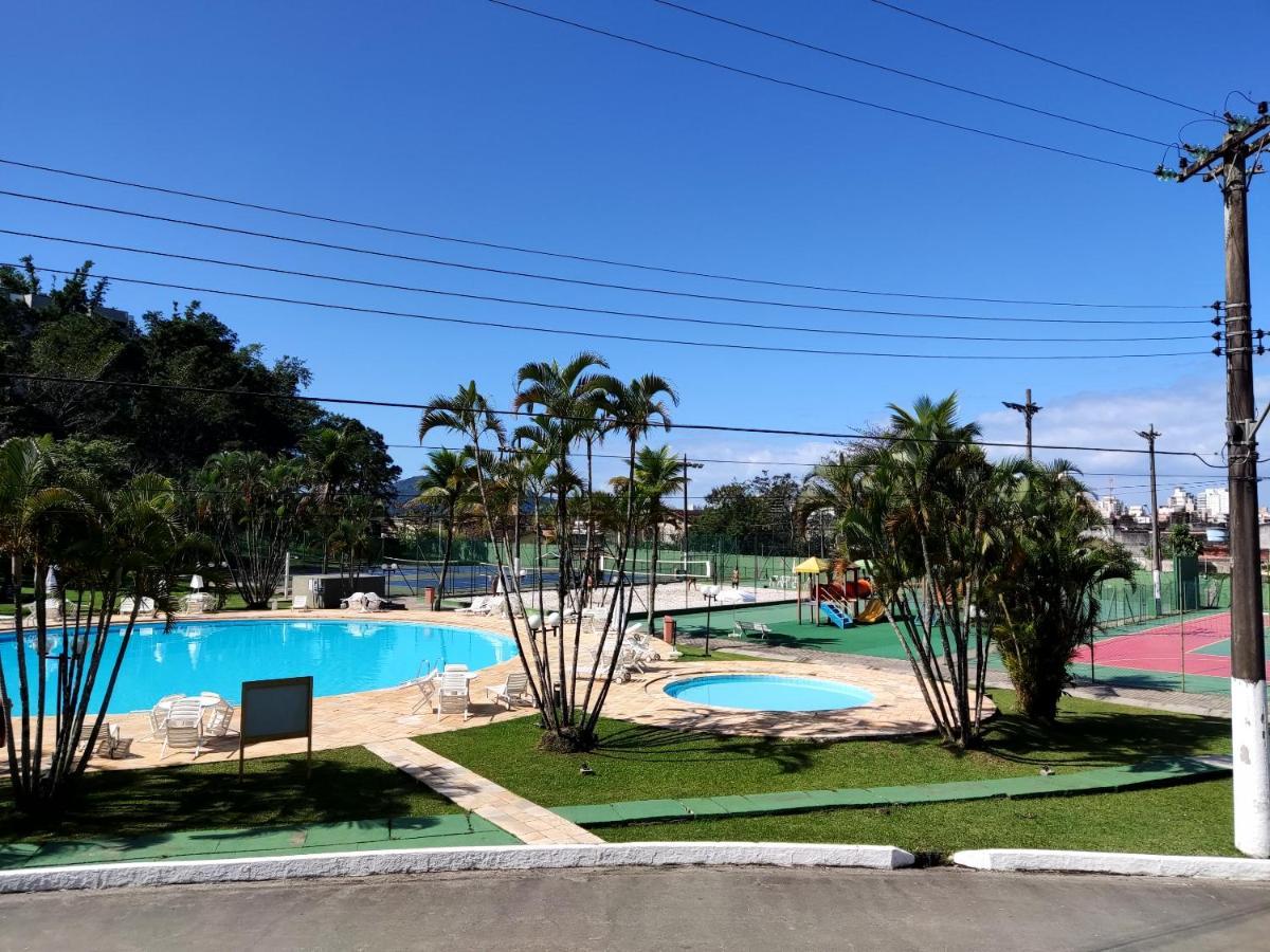 Apartamento até 10 pessoas na enseada Guarujá em condomínio clube praia piscinas salão jogos quadra futebol campo parquinho brinquedos Wi-fi Home office Exterior foto