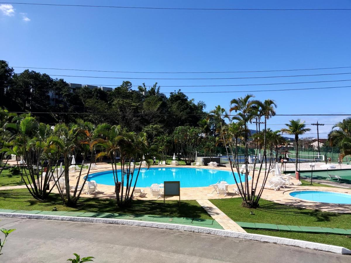 Apartamento até 10 pessoas na enseada Guarujá em condomínio clube praia piscinas salão jogos quadra futebol campo parquinho brinquedos Wi-fi Home office Exterior foto